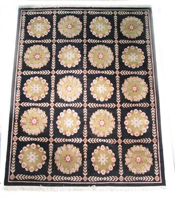 Appraisal: A large Arts and Crafts carpet probably Scottish black ground