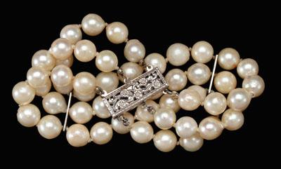 Appraisal: Triple strand cultured pearl bracelet off round to baroque cultured