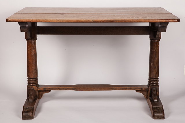 Appraisal: A HEALS STYLE OAK CENTRE TABLE with plain top on