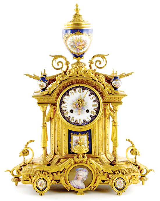 Appraisal: French ormolu-mounted and porcelain mantel clock th century gilt-bronze architectural