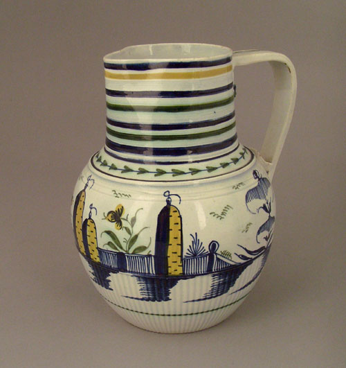 Appraisal: English pearlware pitcher with blue green and rust colored stripes