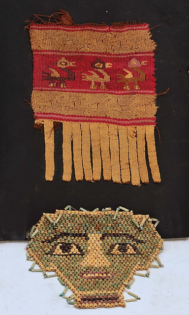 Appraisal: AN ISLAMIC TEXTILE FRAGMENT and an Egyptian bead work small