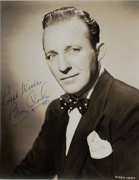 Appraisal: A Bing Crosby signed sepia photograph s A vintage print