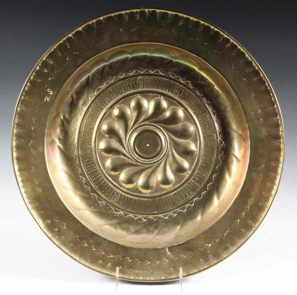 Appraisal: NUREMBERG BRASS ALMS DISH - th Century with a swirled