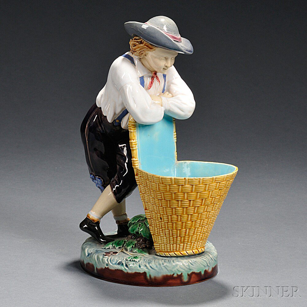 Appraisal: Minton Majolica Model of a Boy Resting on a Tall