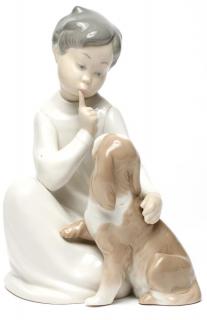 Appraisal: Lladro Porcelain Boy with Dog Figurine Designed by sculptor Vincente