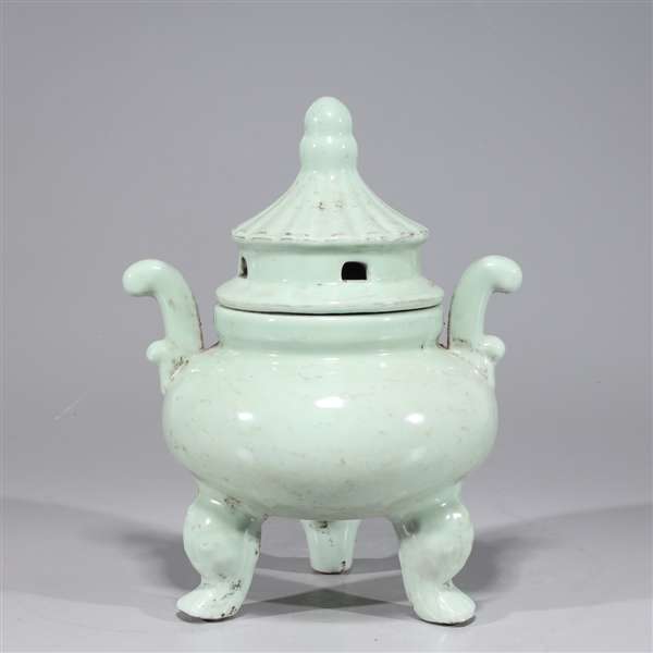 Appraisal: Chinese celadon glazed tripod porcelain incense burner with handles some