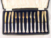 Appraisal: A boxed set of six pairs of silver handled fruit