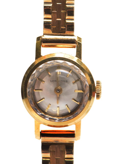 Appraisal: A LONGINES LADIES CT GOLD WRISTWATCH the silvered dial with