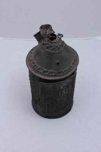 Appraisal: AN ANTIQUE IRON LANTERN with hinged door and pierced decoration