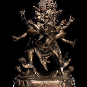 Appraisal: A Sino-Tibetan Gilt Bronze Figure of a Bodhisattva the multi-armed