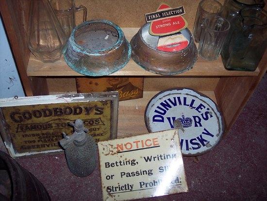 Appraisal: A quantity of sundries including signs a soda siphon enamel