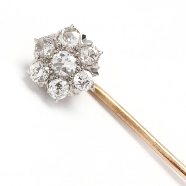 Appraisal: Gold and Diamond Stick Pin In a floral motif set