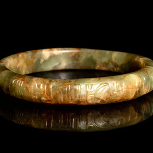 Appraisal: A Chinese Celadon Jade Bangle the mottled celadon stone with