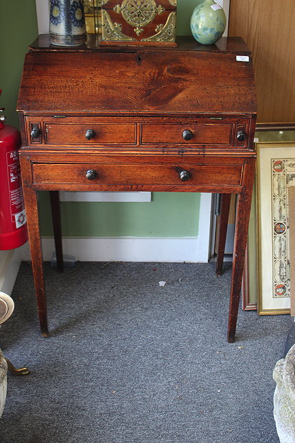 Appraisal: AN EARLY TH CENTURY PINE BUREAU with fall front two