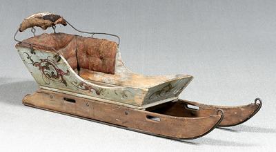 Appraisal: Painted wooden sled iron runners cradle style with upholstered interior