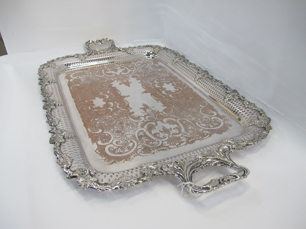 Appraisal: A silver plated double handled serving tray