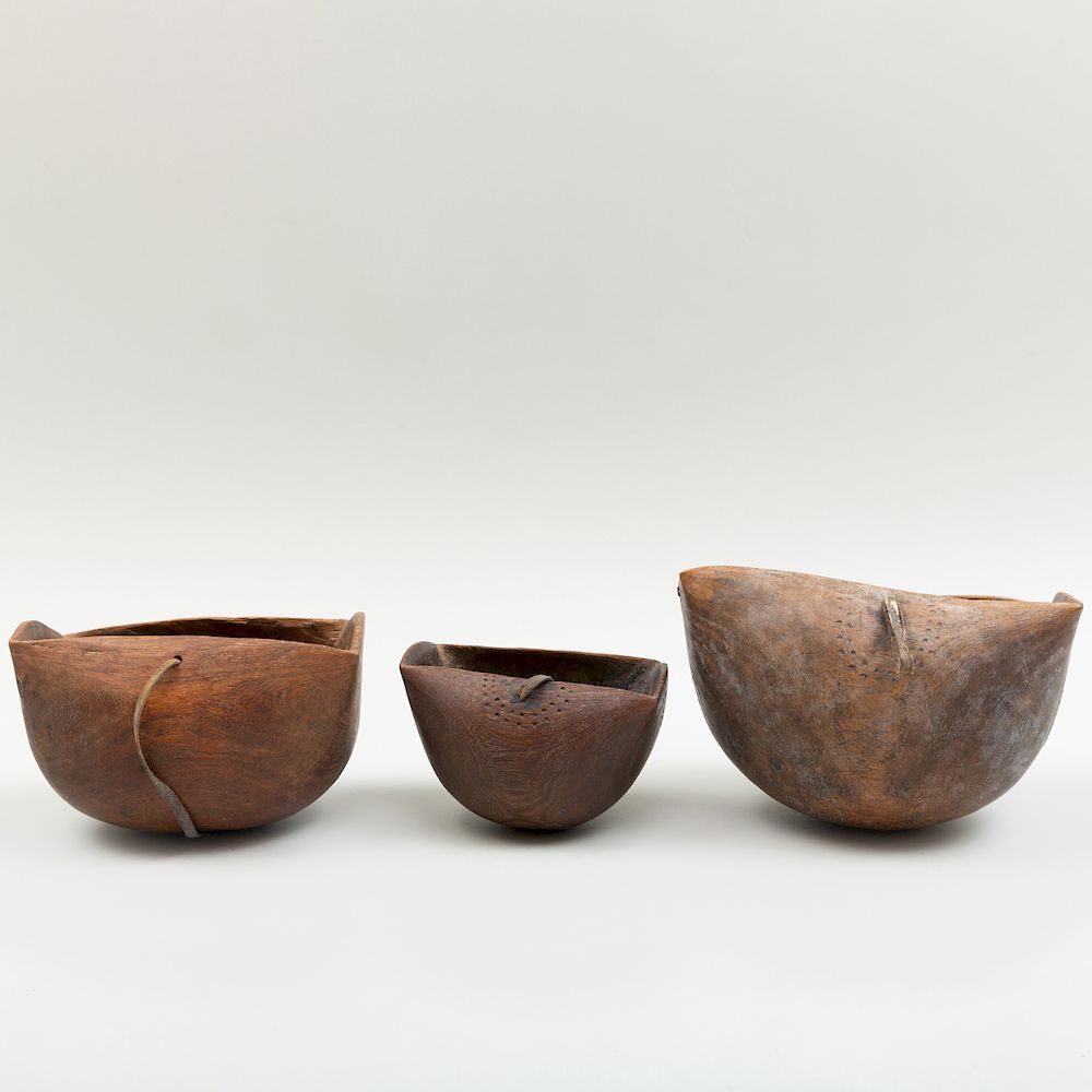 Appraisal: Group of Three Kenyan Wood Milk Vessels Each fitted with