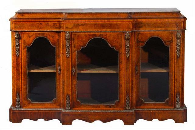 Appraisal: A VICTORIAN FIGURED WALNUT SHAPED FRONT SIDE CABINET the interior