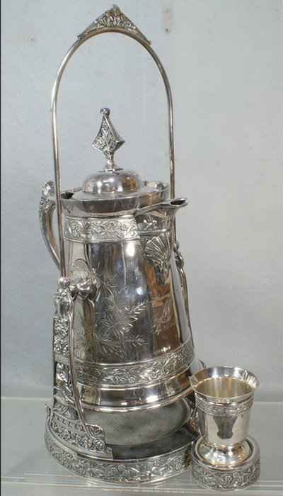 Appraisal: American plated silver tilting water pitcher on stand signed A