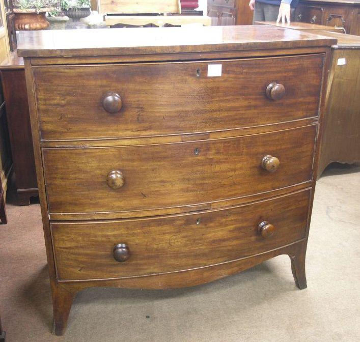 Appraisal: An early Victorian mahogany bow fronted chest three drawers each