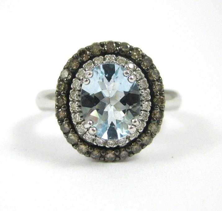 Appraisal: LEVIAN AQUAMARINE AND DIAMOND RING The k white gold ring