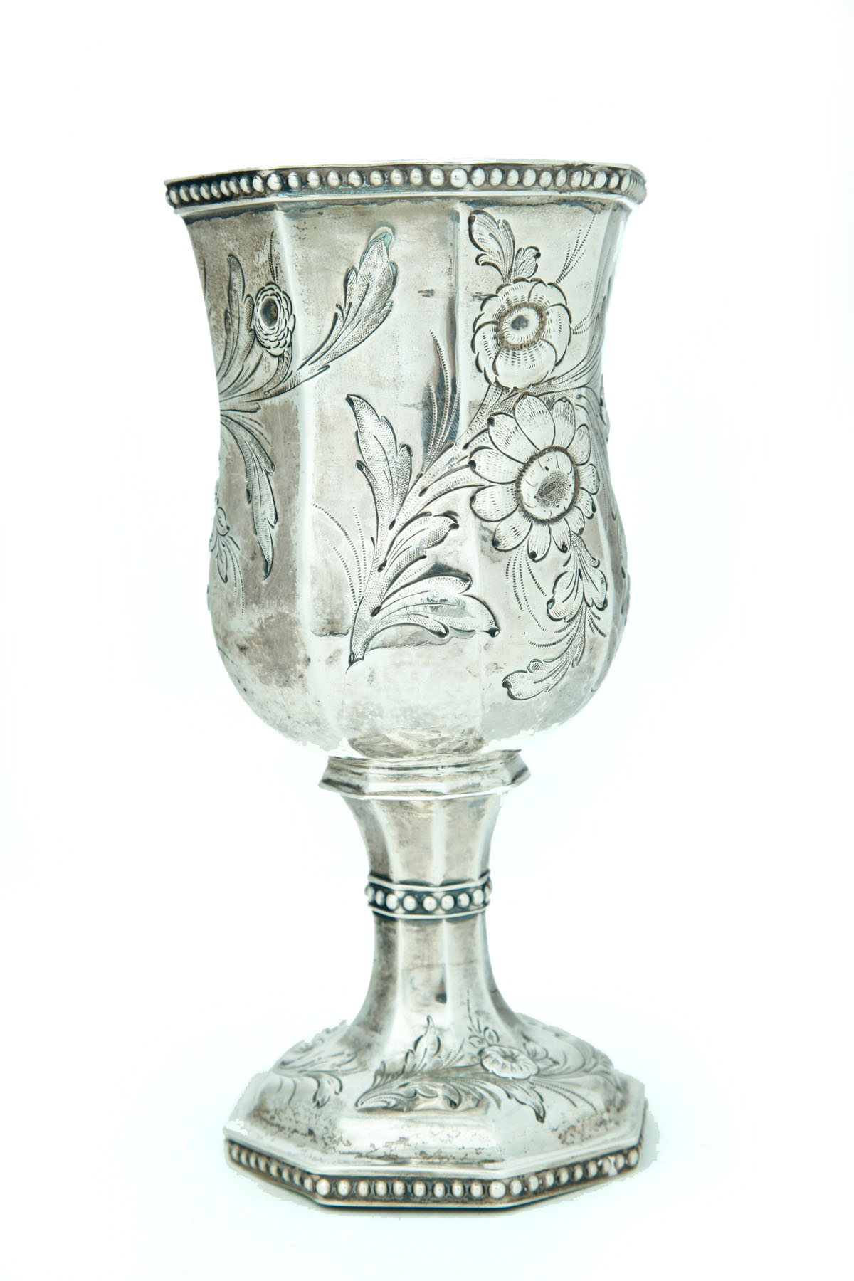 Appraisal: SILVER CHALICE American mid th century Paneled chalice with repousse