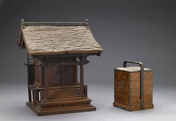 Appraisal: A group of four Japanese carved wood decorations including a