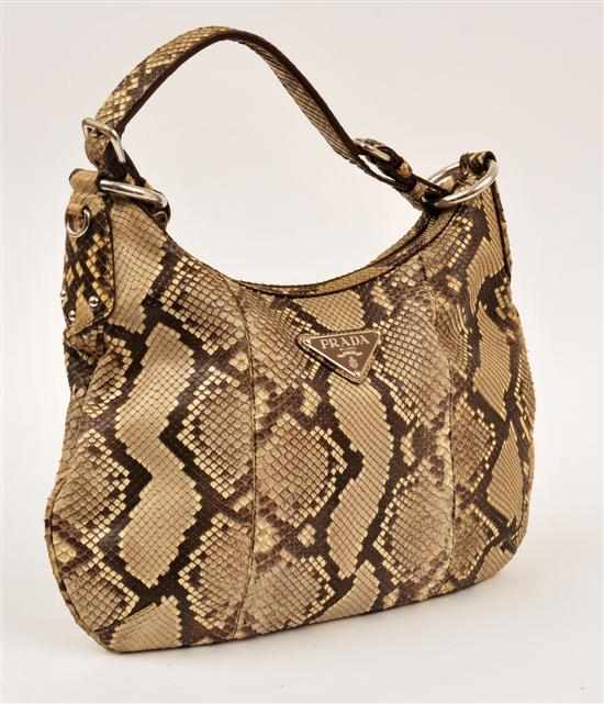 Appraisal: A PYTHON SHOULDER BAG BY PRADA The saddle style bag