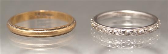 Appraisal: Lady's K yellow gold wedding band together with an K