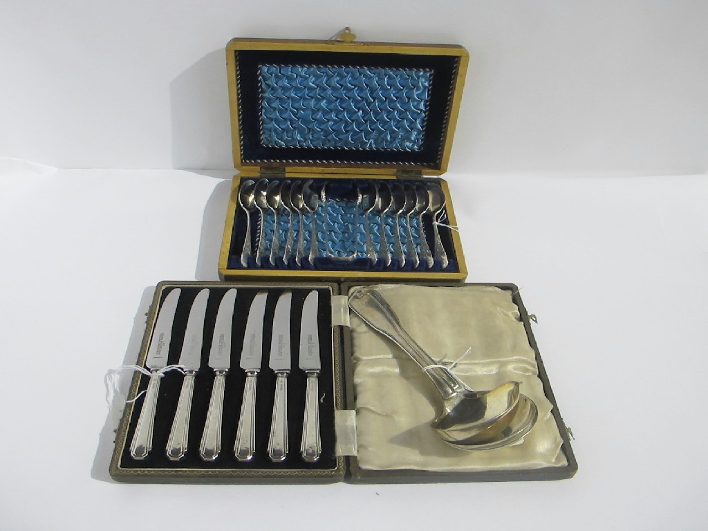 Appraisal: A lot comprising a cased set of silver handled knives