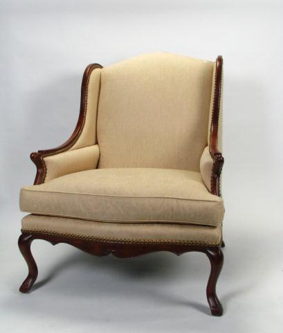 Appraisal: Century Furniture wing chair with gold-cream upholstery back leg has