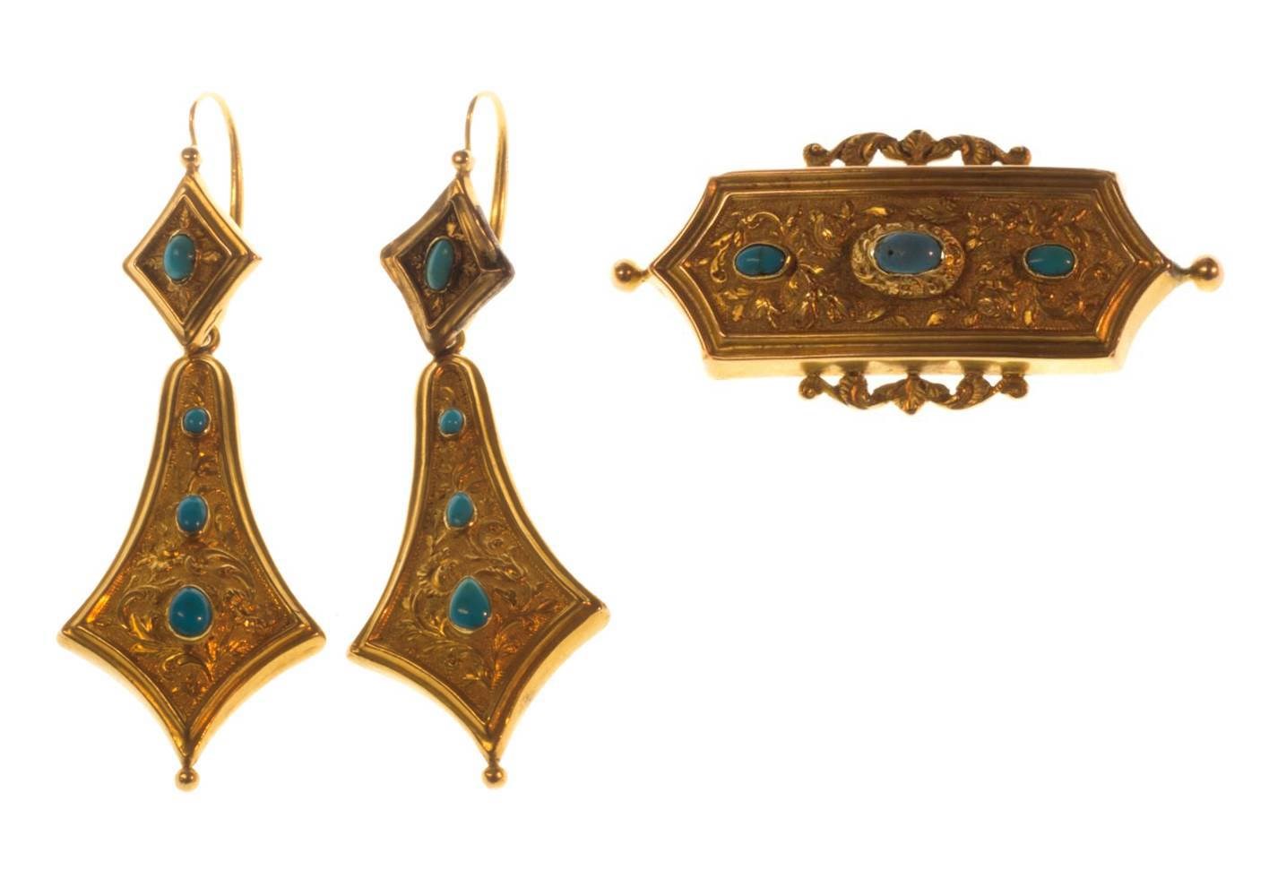 Appraisal: A gold turquoise and blue paste set three stone brooch