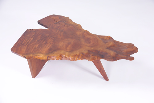 Appraisal: GEORGE NAKASHIMA Fine coffee table with crotch-figured free edge top