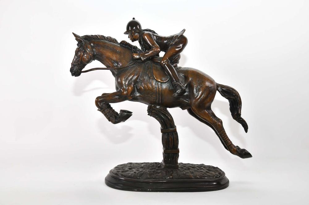 Appraisal: PATINATED BRONZE OF A JUMPING HORSE WITH RIDERRealistically modeled jumping