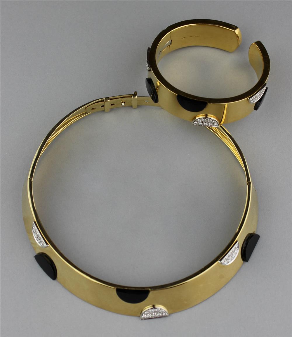 Appraisal: K ITALIAN YELLOW GOLD TORQUE NECKLACE AND MATCHING HINGED CUFF