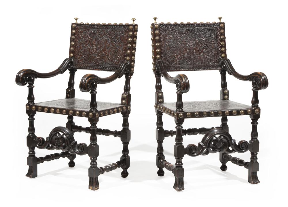 Appraisal: Pair of Antique Iberian Walnut and Tooled Leather Armchairs probably