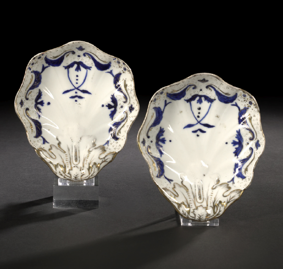 Appraisal: Pair of Parcel-Gilt Blue-and-White Paris Porcelain Condiment Dishes third quarter