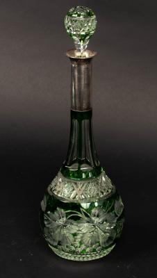 Appraisal: A green flash cut glass decanter with a German standard