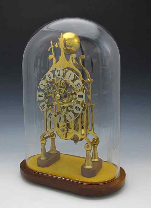 Appraisal: BRASS SKELETON CLOCK UNDER GLASS DOME Late th to early