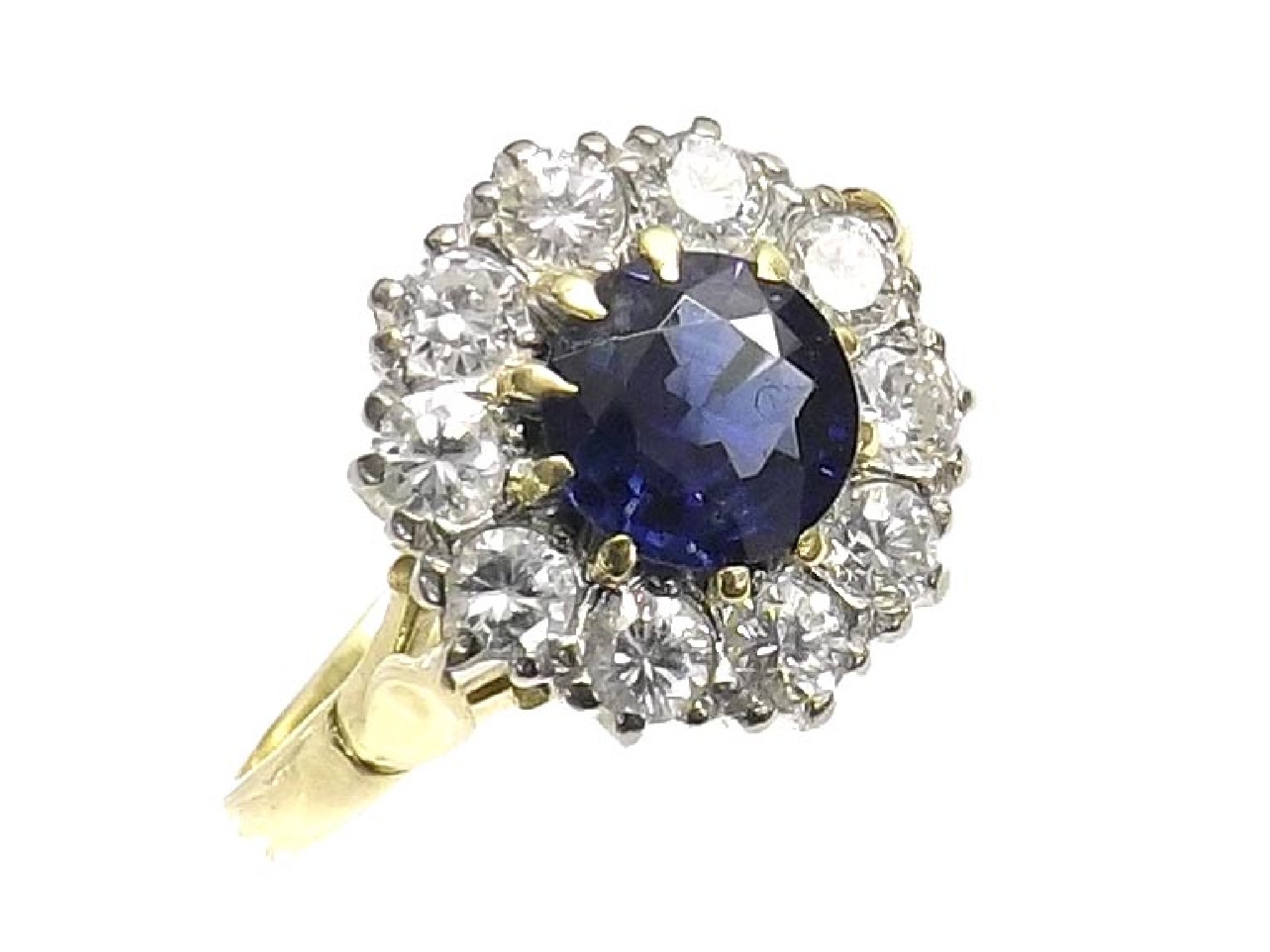 Appraisal: ct sapphire and diamond circular cluster ring the round-cut central