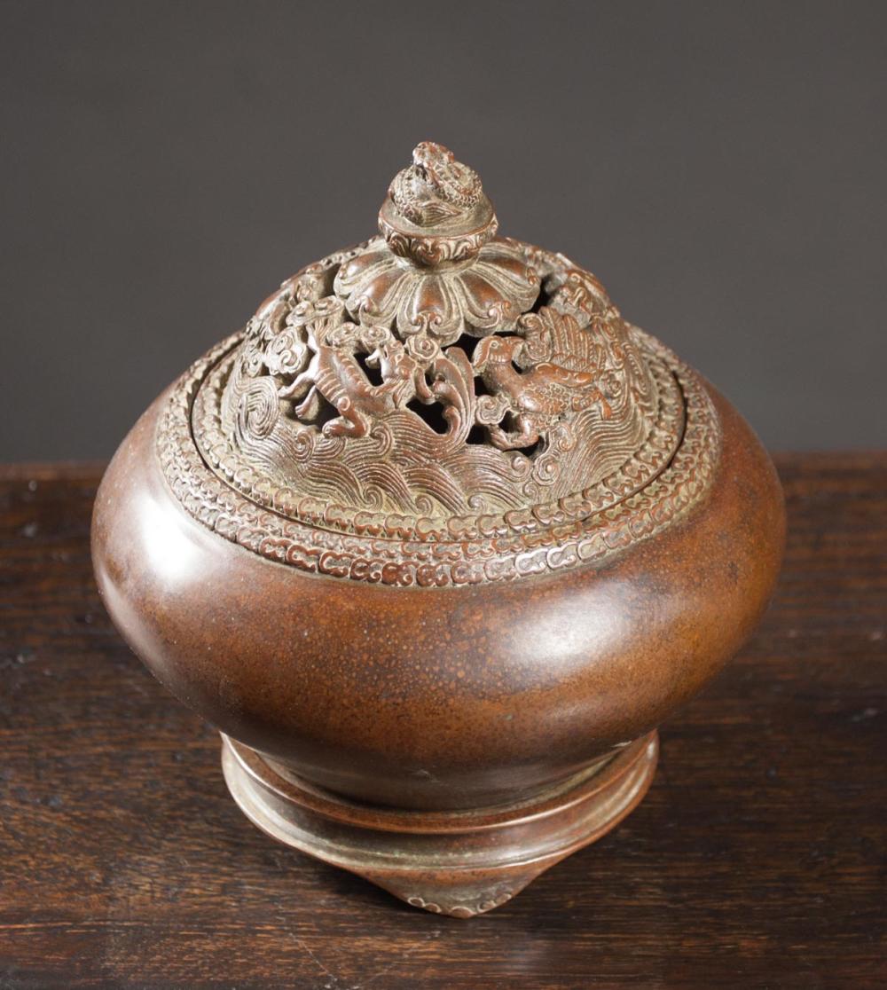 Appraisal: CHINESE BRONZE LIDDED CENSER of squat circular form with pierced