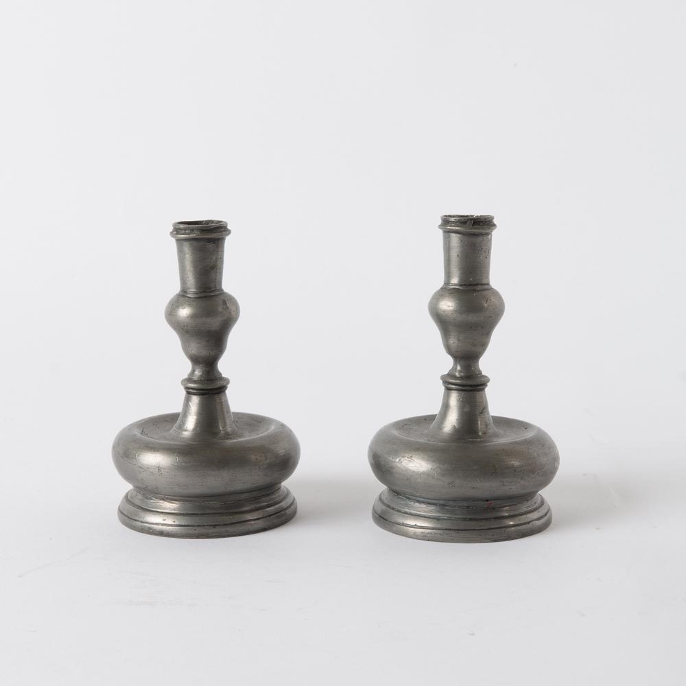 Appraisal: PAIR OF PEWTER CANDLE HOLDERS CIRCA A pair of continental