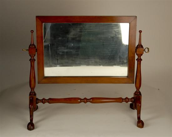 Appraisal: A Tilting Mahogany Dressing Mirror with a rectangular mirror supported