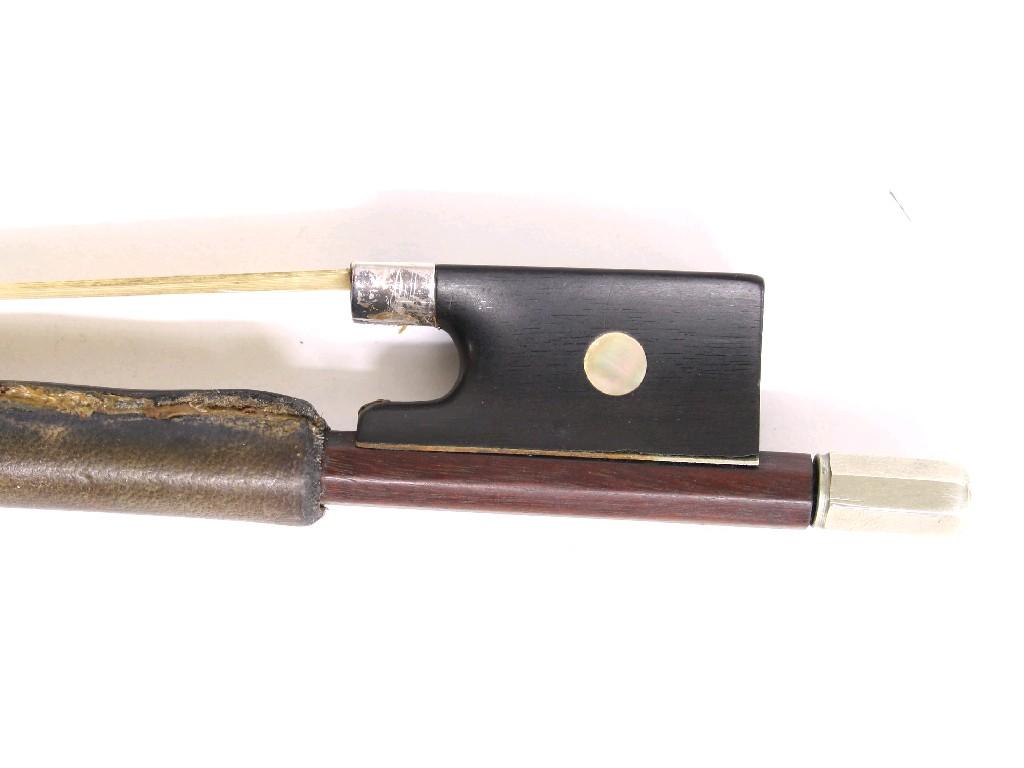 Appraisal: Interesting violin bow unstamped the stick octagonal the ebony frog