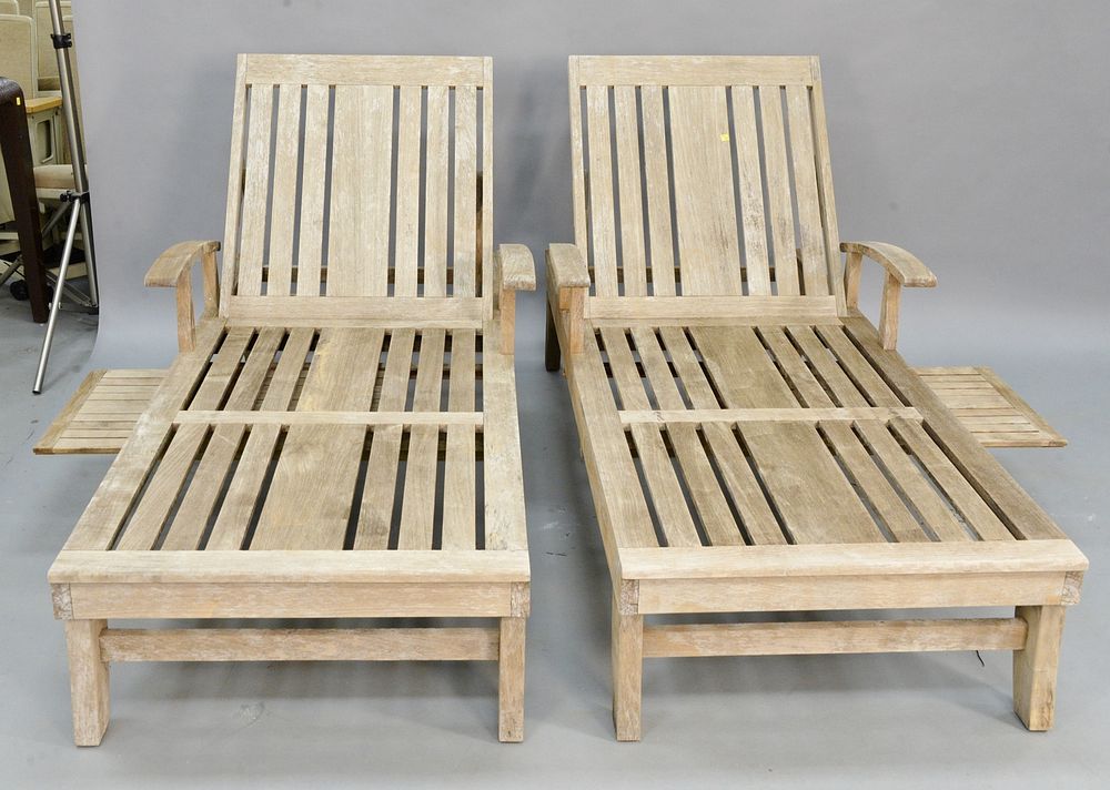 Appraisal: Pair of Frontgate teak outdoor chaise lounges retail for approximately