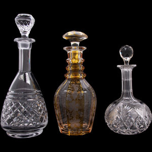 Appraisal: A Group of Three Cut Glass Decanters comprising an American