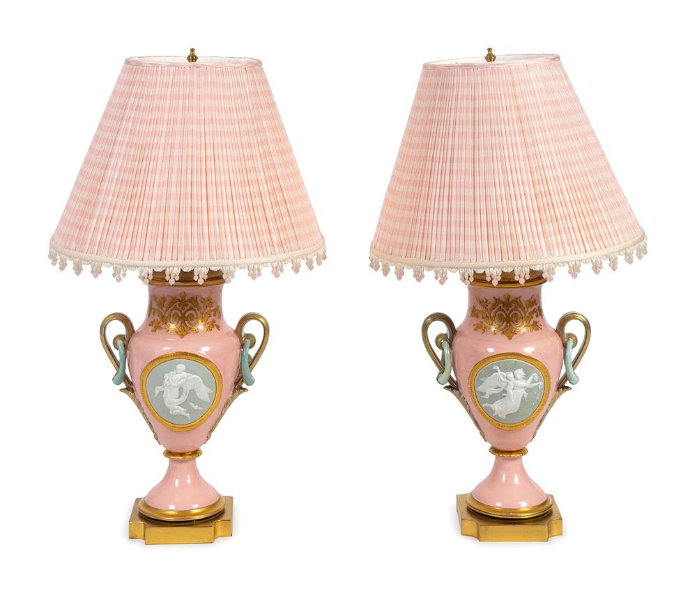 Appraisal: A Pair of Continental Porcelain Vases Mounted as Lamps Height