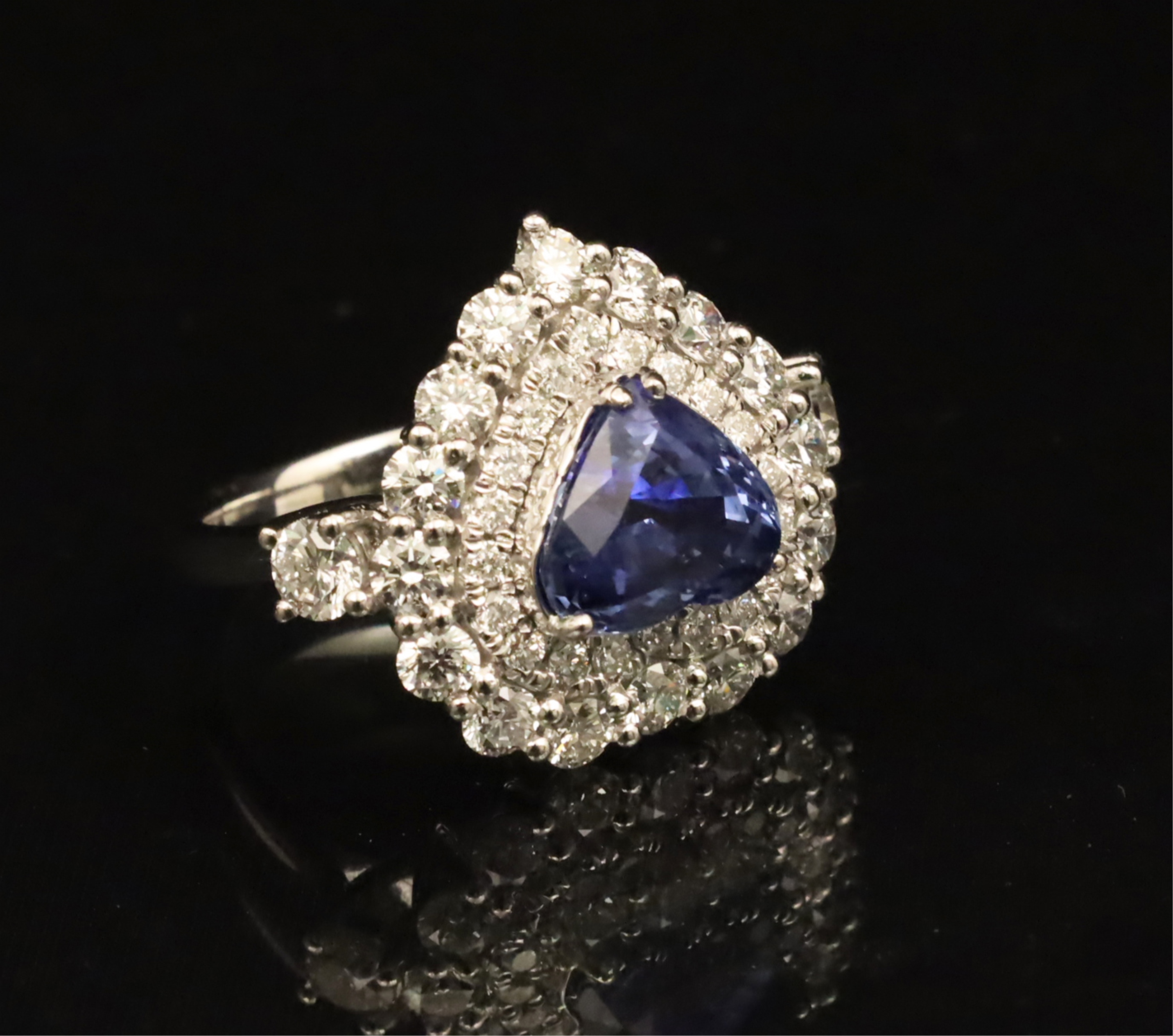 Appraisal: PLATINUM SAPPHIRE AND DIAMOND HEART SHAPED RING Platinum Sapphire and