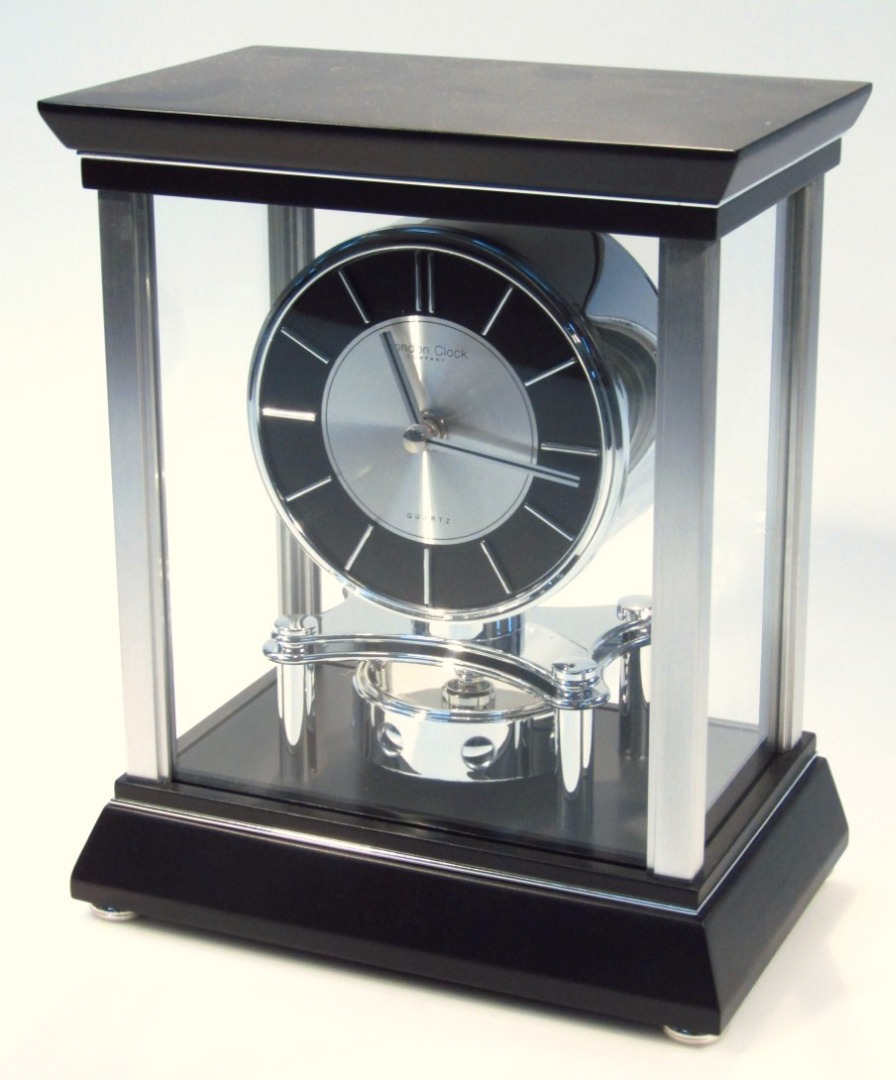 Appraisal: A modern London Clock Company Atmos style mantel clock with